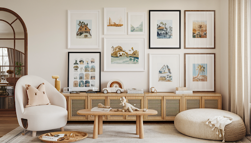 The image showcases a sophisticated child-friendly art space with an elegant interior featuring a variety of Slim Aarons framed prints in white, black, natural wood, and dark wood frames, blending coastal, vintage, and Americana aesthetics to create a warm, inviting atmosphere with quality craftsmanship, suitable for families and reflecting a commitment to accessibility and luxury for a mid to upper mid-market audience.